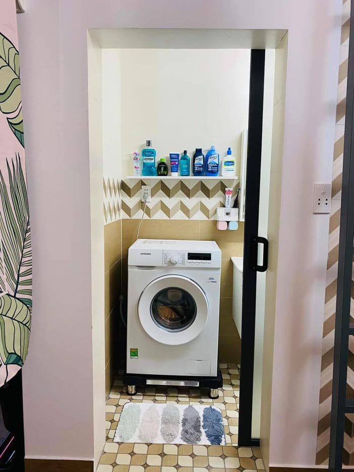 Máy giặt nhỏ đặt trong phòng vệ sinh